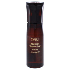 Oribe Maximista: spray engrosador en botella para volumen intenso y cuerpo duradero.