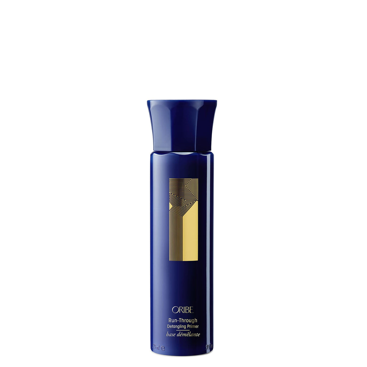 Oribe Run-Through Detangler bottle offers a lightweight conditioning mist for silky, knot-free hair.