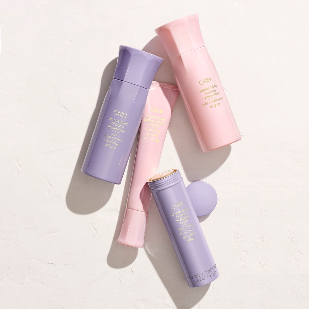 Oribe Serene Scalp Dry Shampoo Powder brush-on application detail.