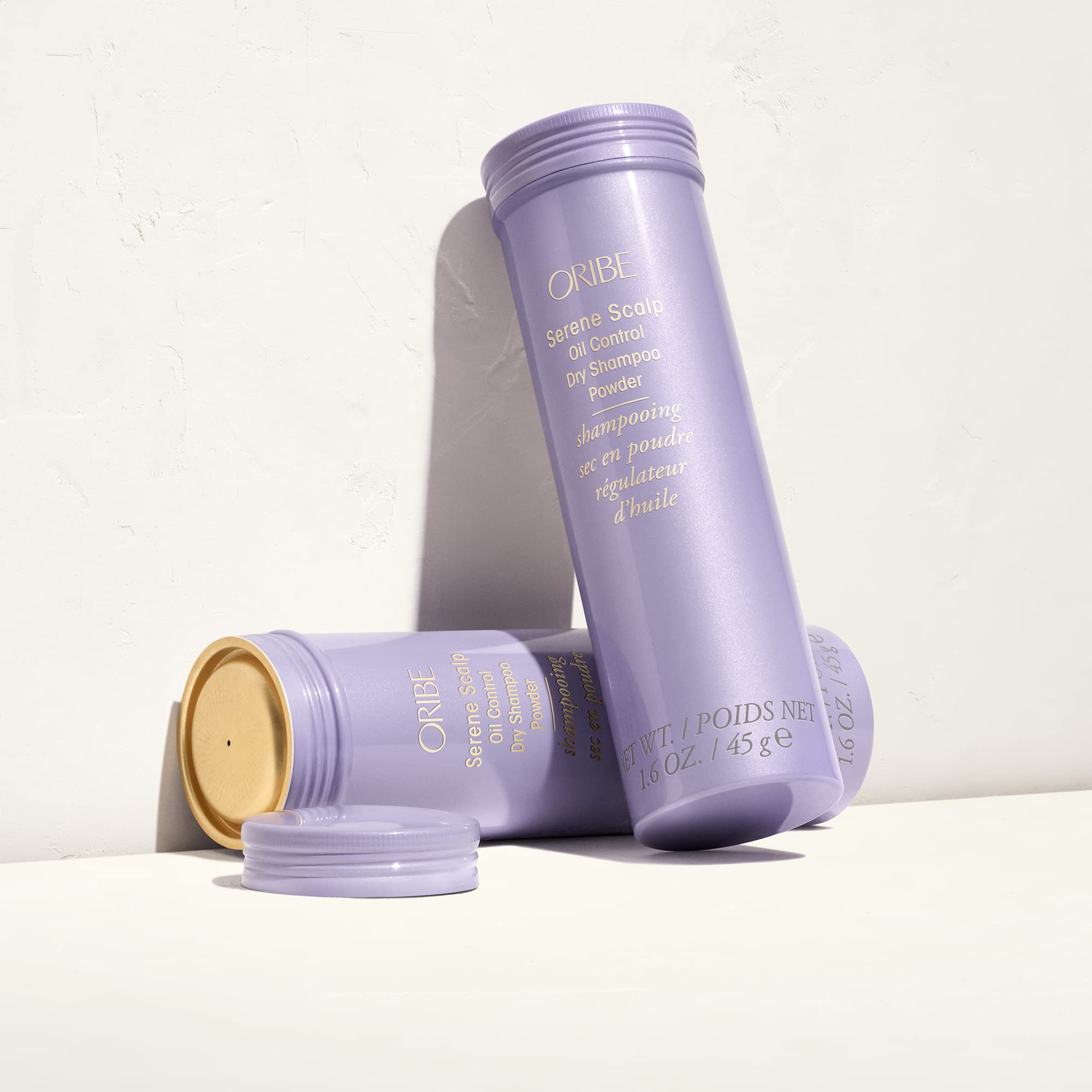 Oribe Serene Scalp Dry Shampoo Powder compact-sized packaging.