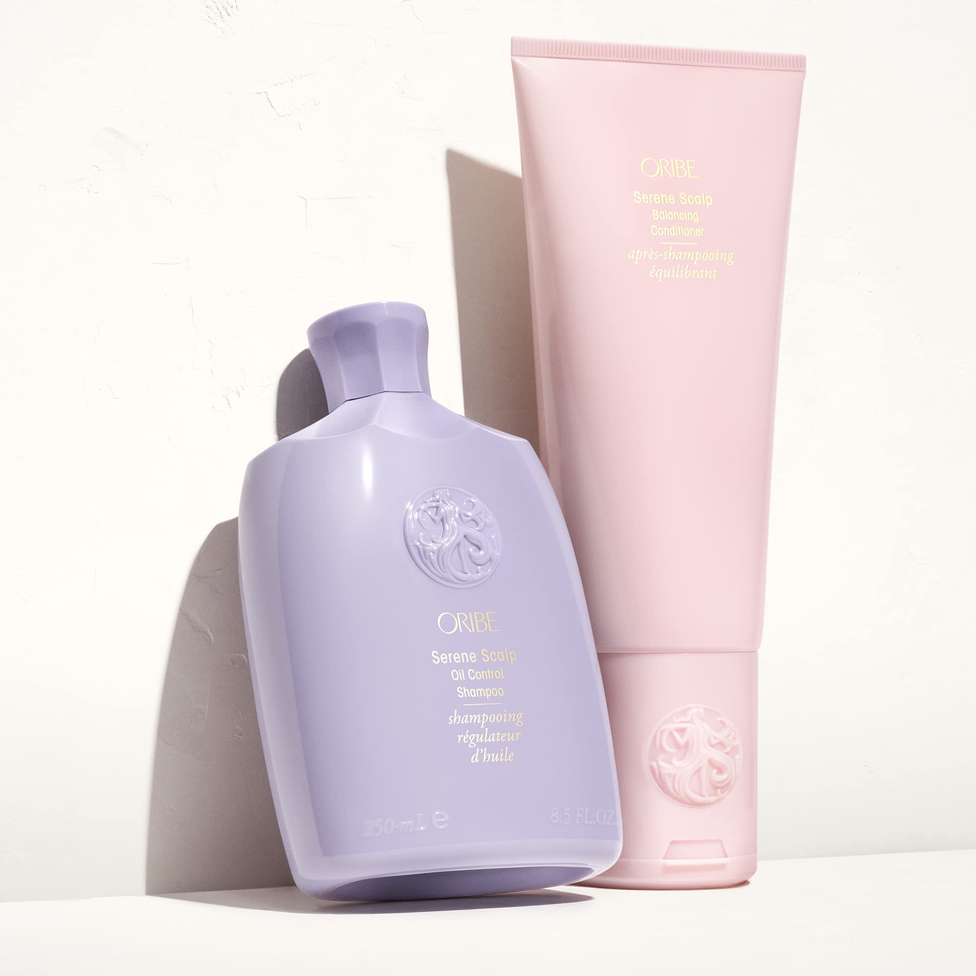 Oribe Serene Scalp Oil Control Shampoo with green marine algae for oil regulation.