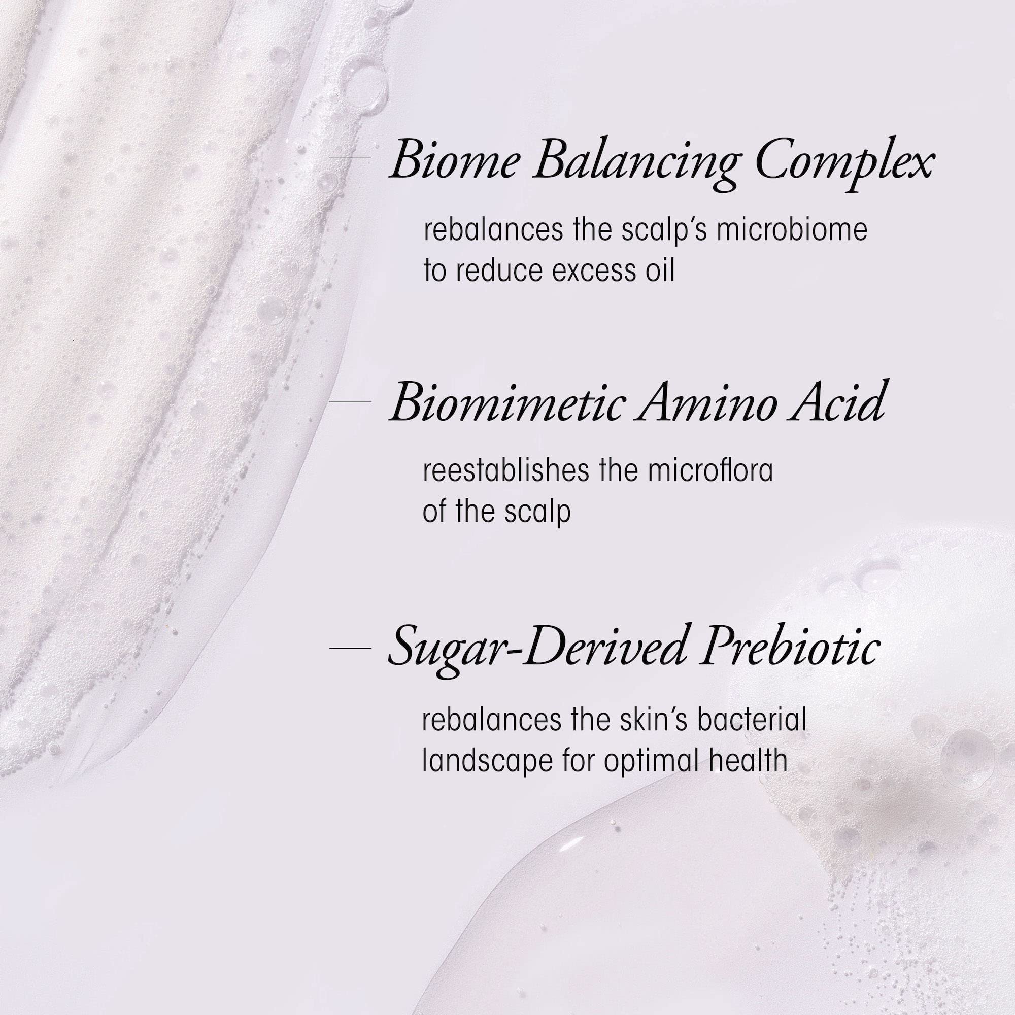Oribe Serene Scalp Oil Control Shampoo lather close-up showing gentle cleansing.