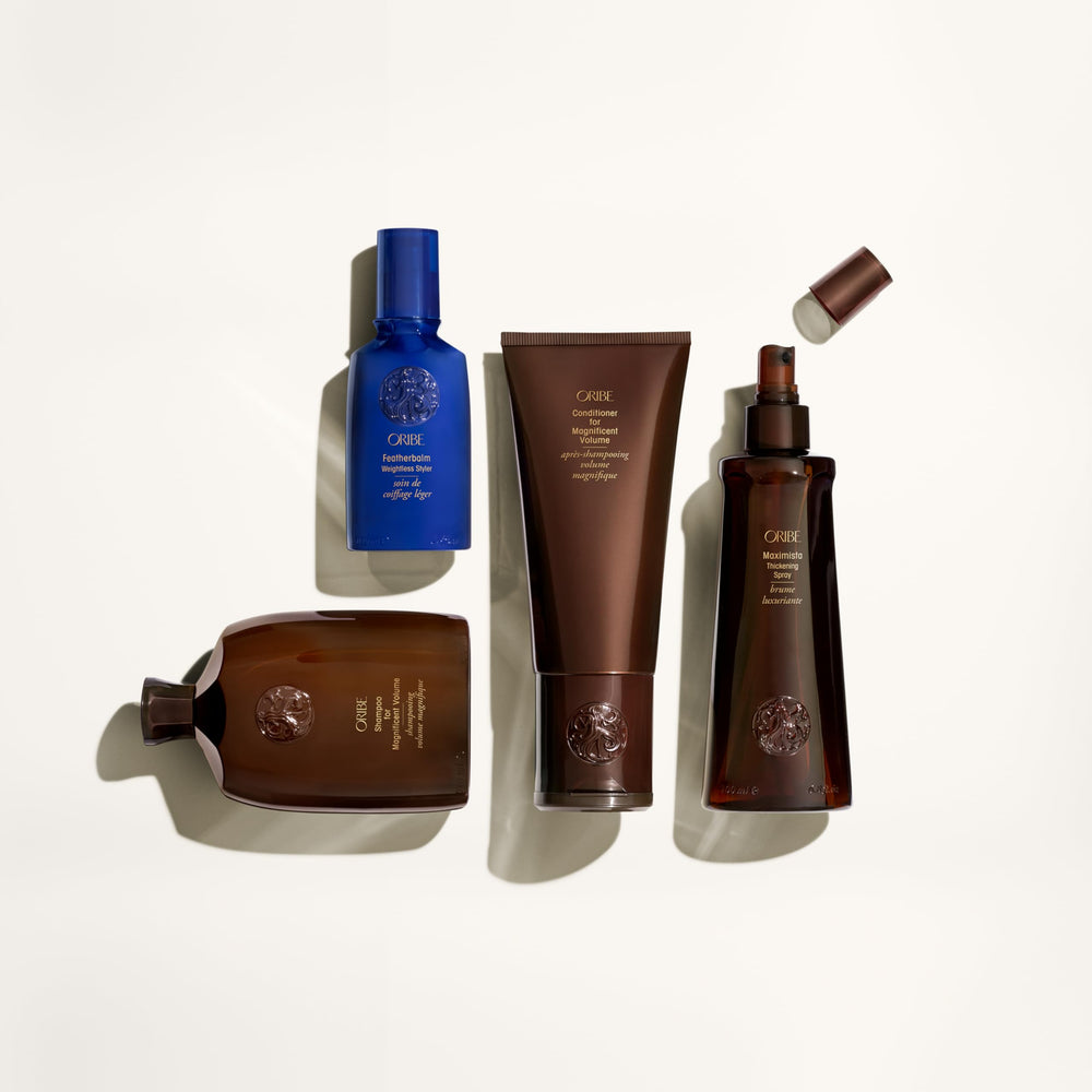 Oribe label close-up emphasizes paraben-free formula and UV protection.