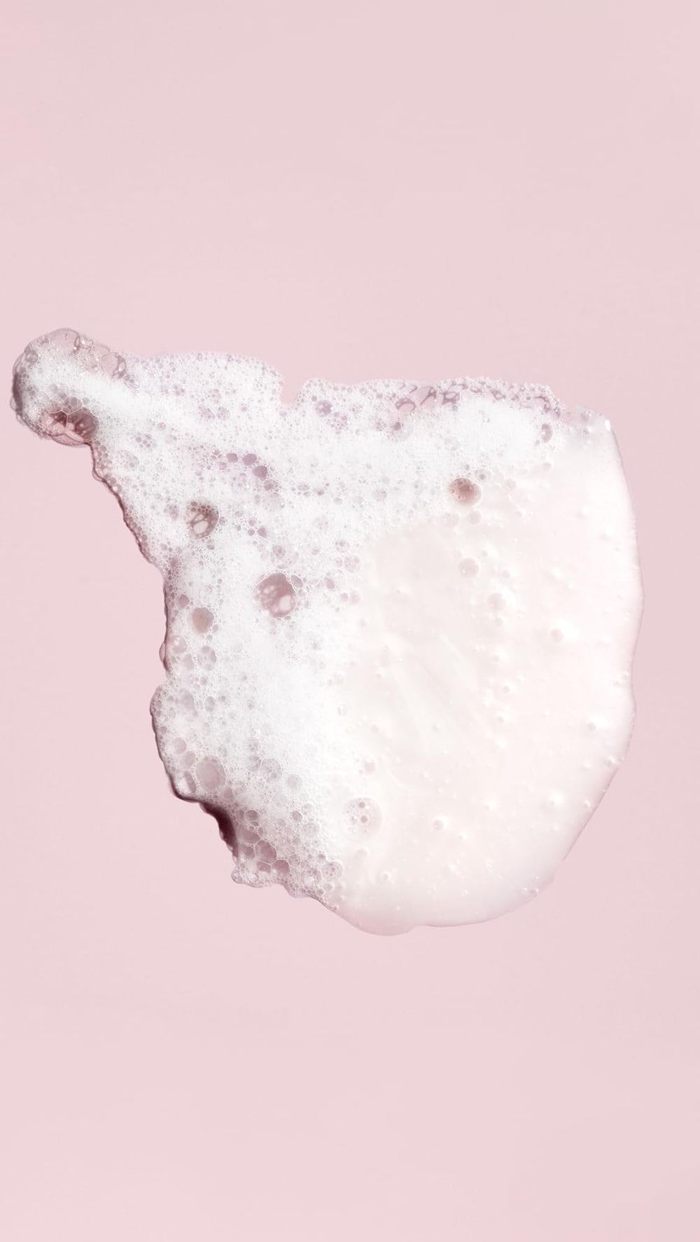Oribe Shampoo for Beautiful Color on a vanity, emphasizing color preservation