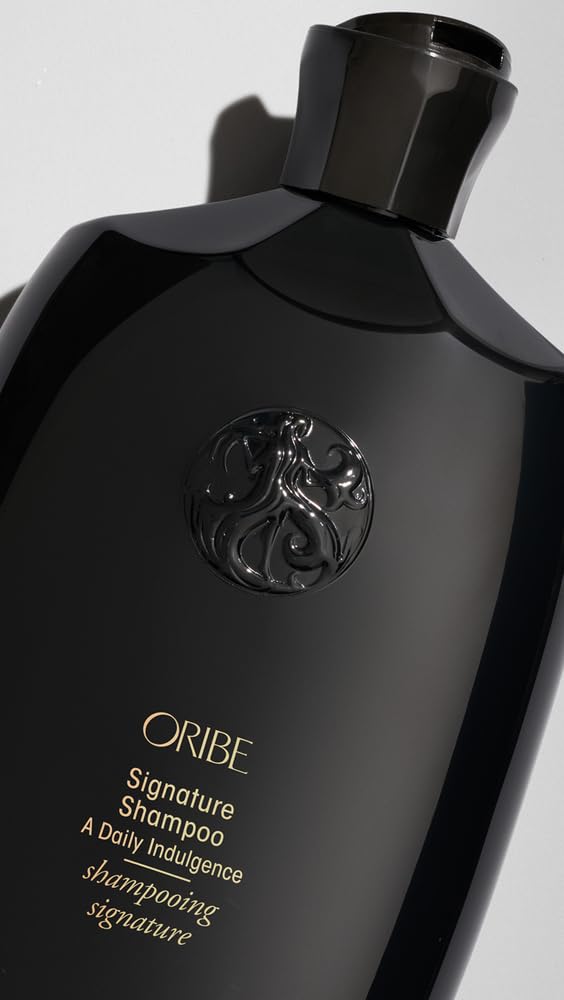 Hair texture close-up after using Oribe Signature Shampoo shows smoothness.
