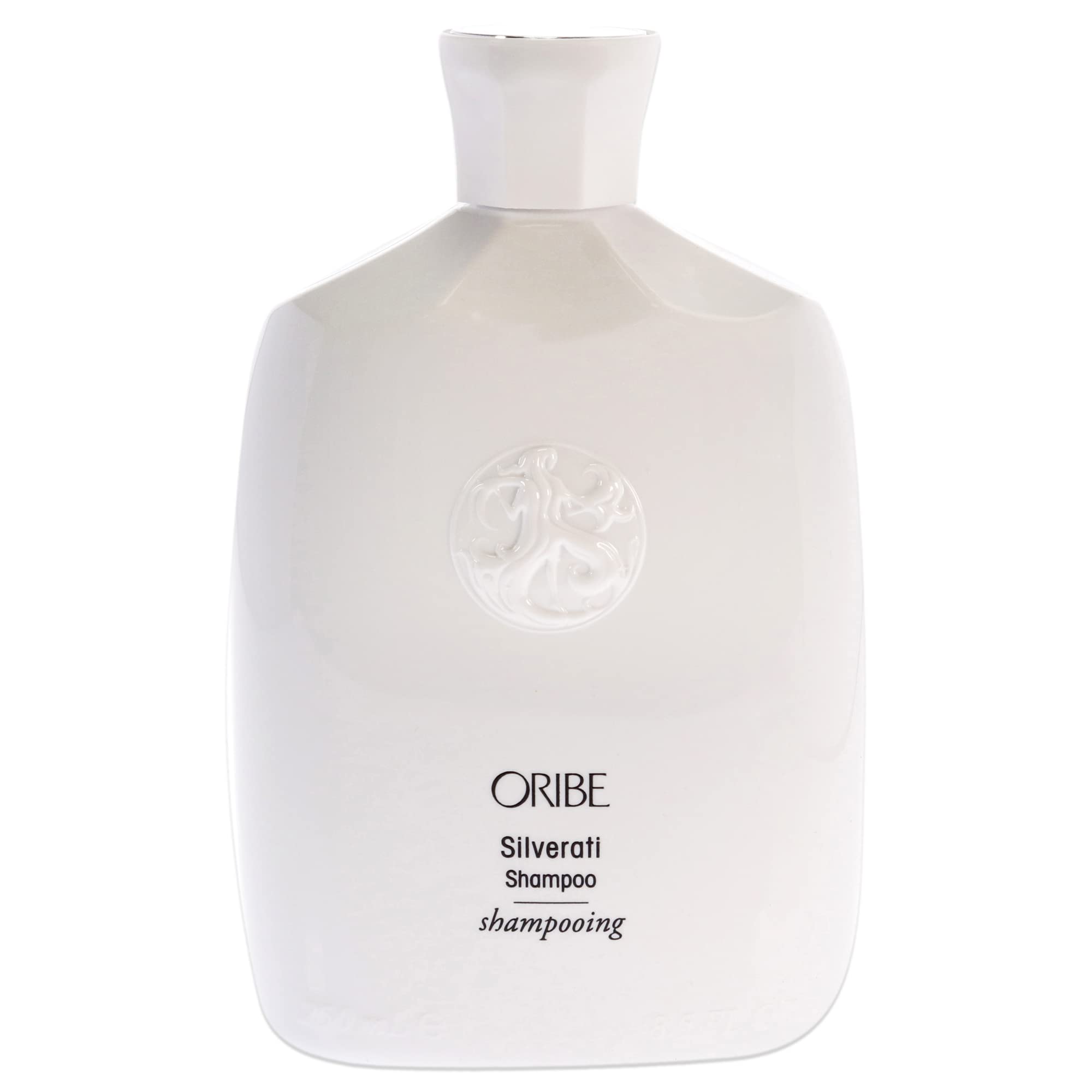 Oribe Silverati Shampoo pour-action for even distribution on silver strands.