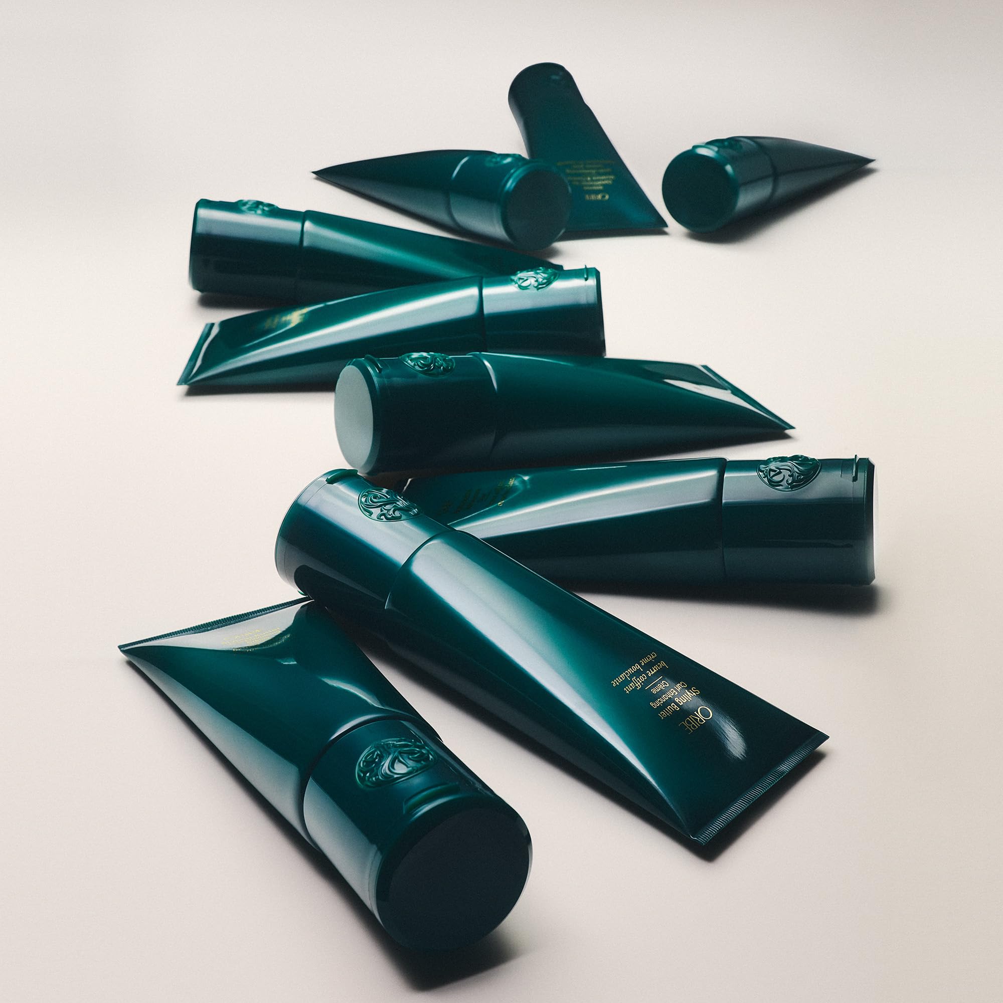 Oribe product display highlights silicone-free vegan formula