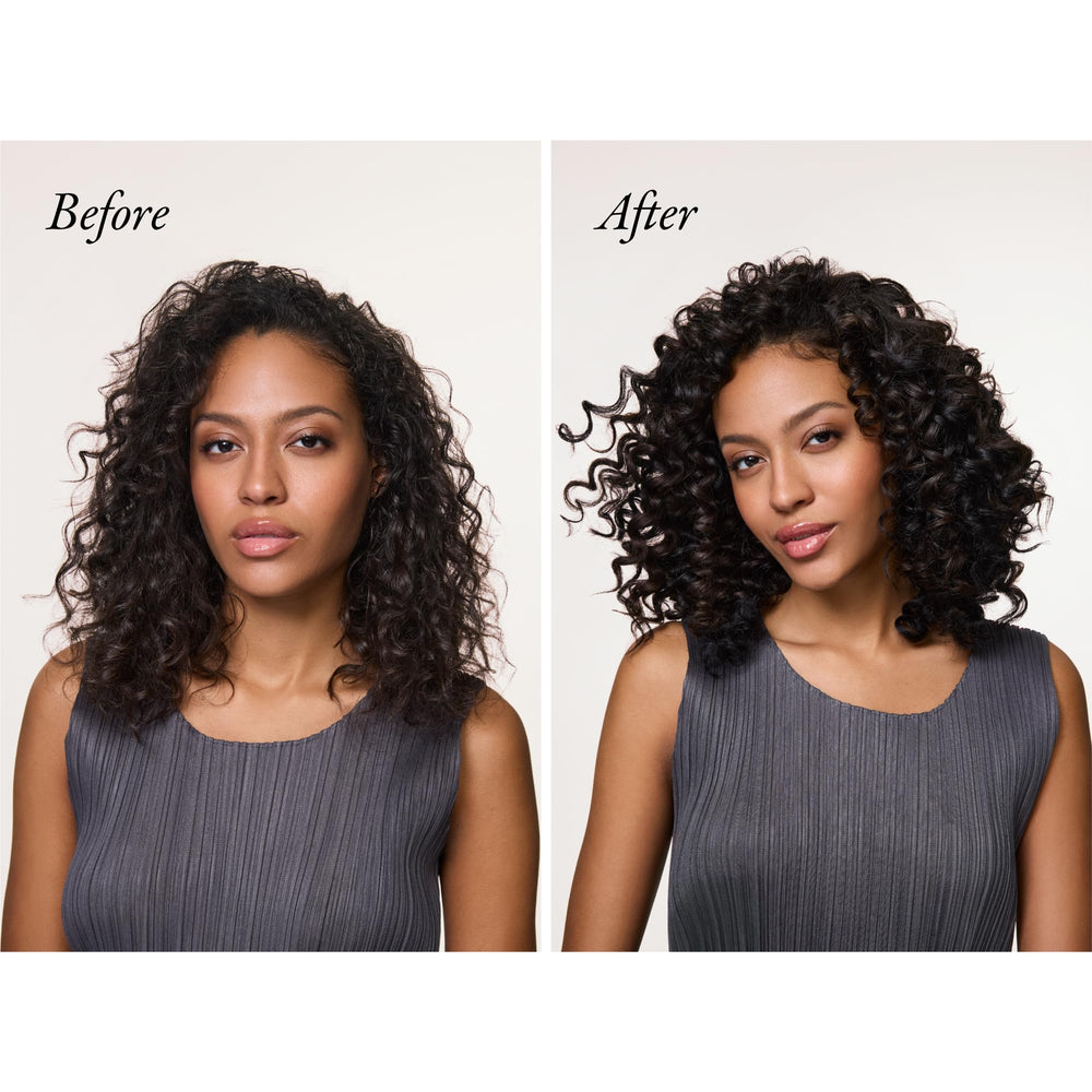 Oribe Supershine Conditioner silky hair application for easy detangling.