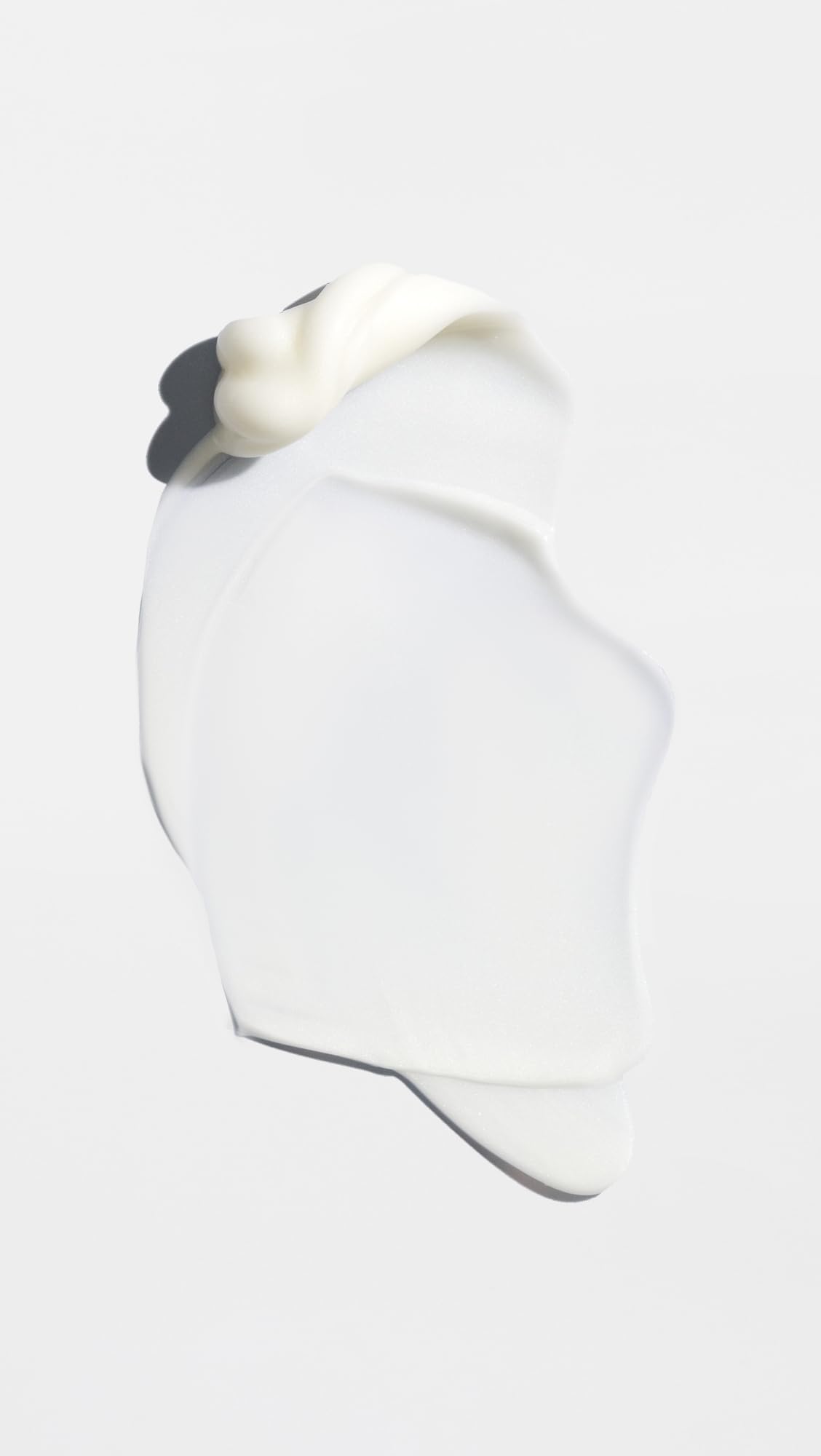 Oribe Supershine cream-texture-closeup reveals silky consistency.
