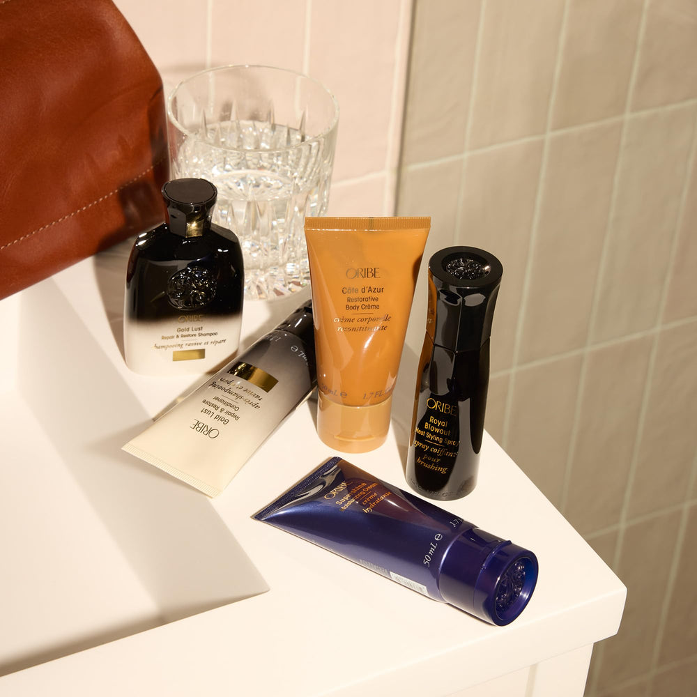 Frizz-control and smoother texture achieved with Oribe Supershine moisturizer.
