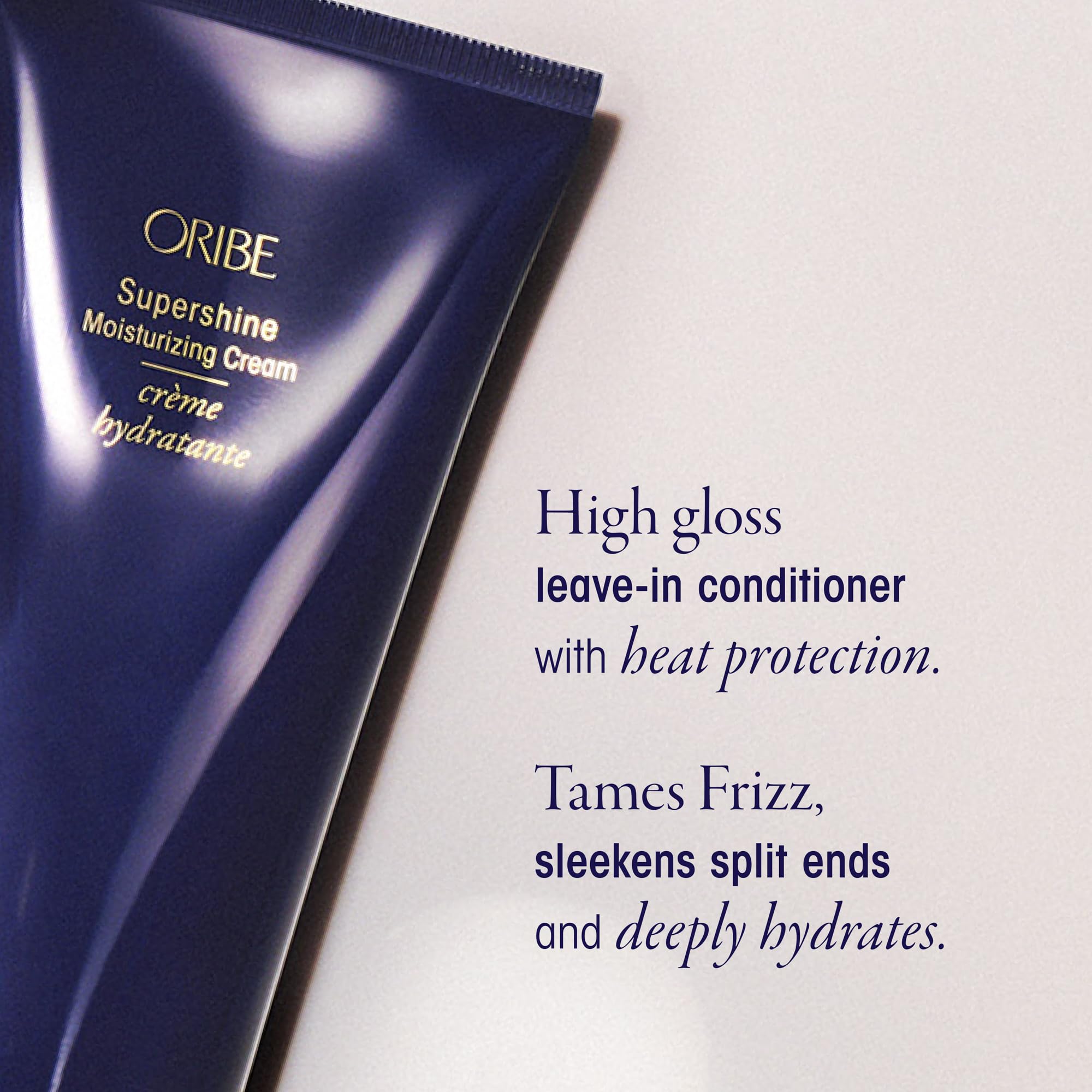 Oribe Supershine Shampoo with water droplets emphasizing shine.