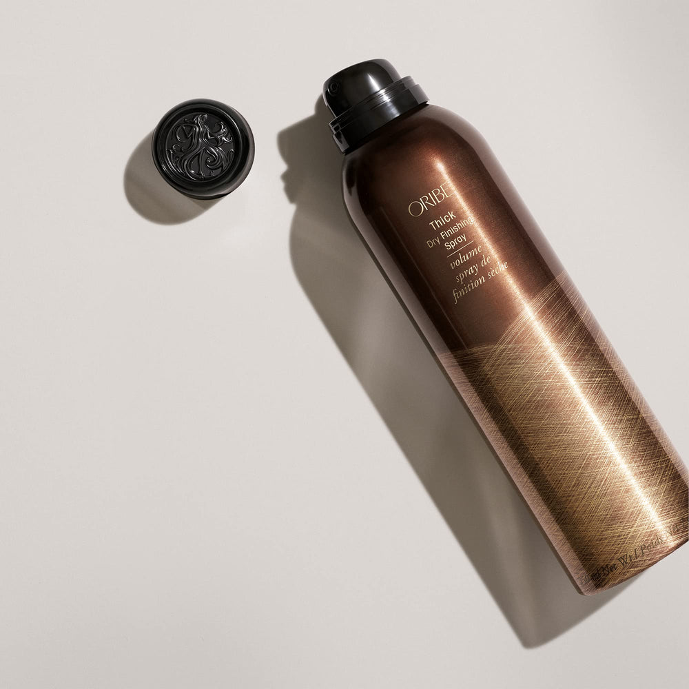 Oribe Thick Dry Finishing Spray mist application demonstrates even coverage