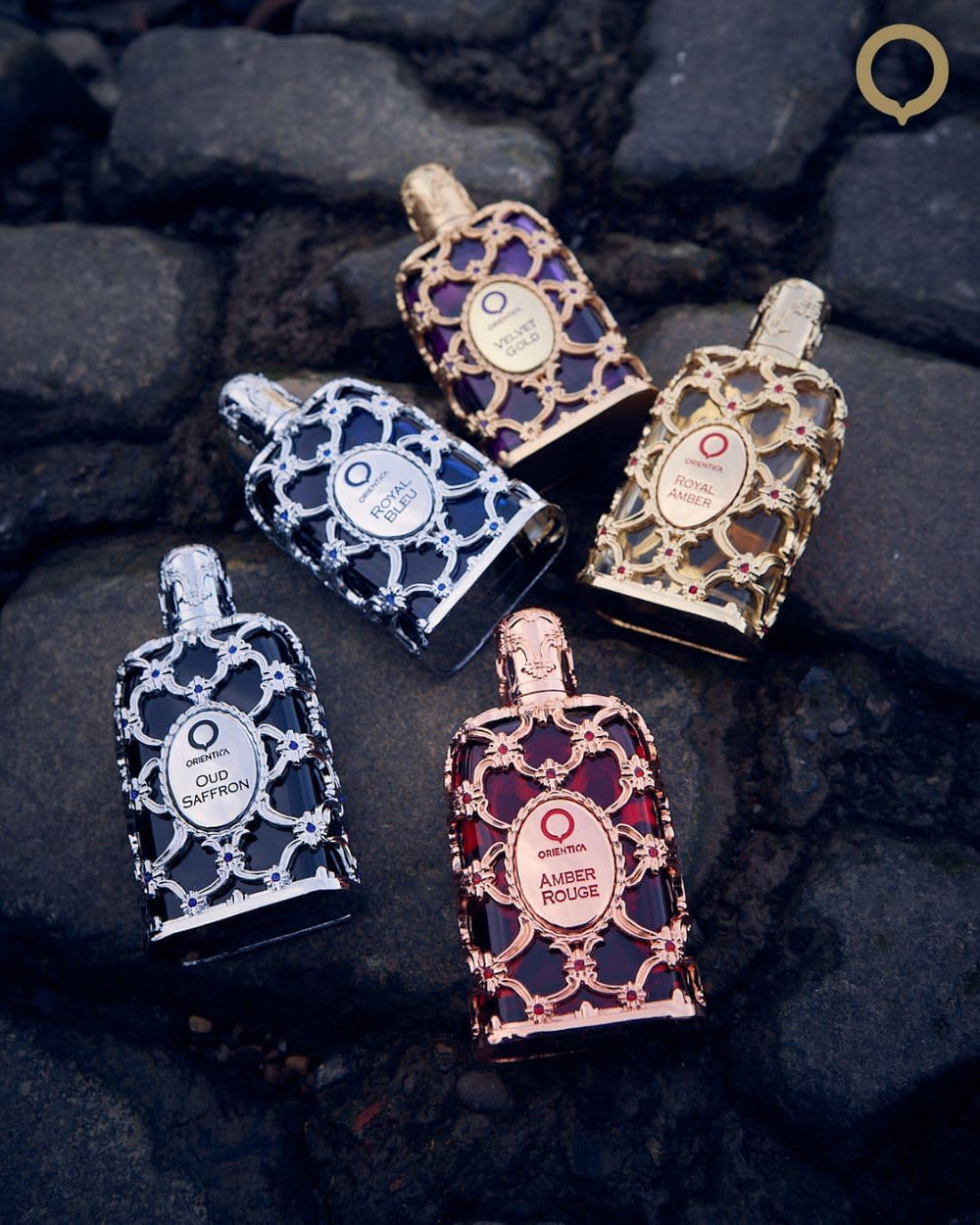 Orientica Amber Rouge spray action, capturing lasting fragrance for after-dark moments.