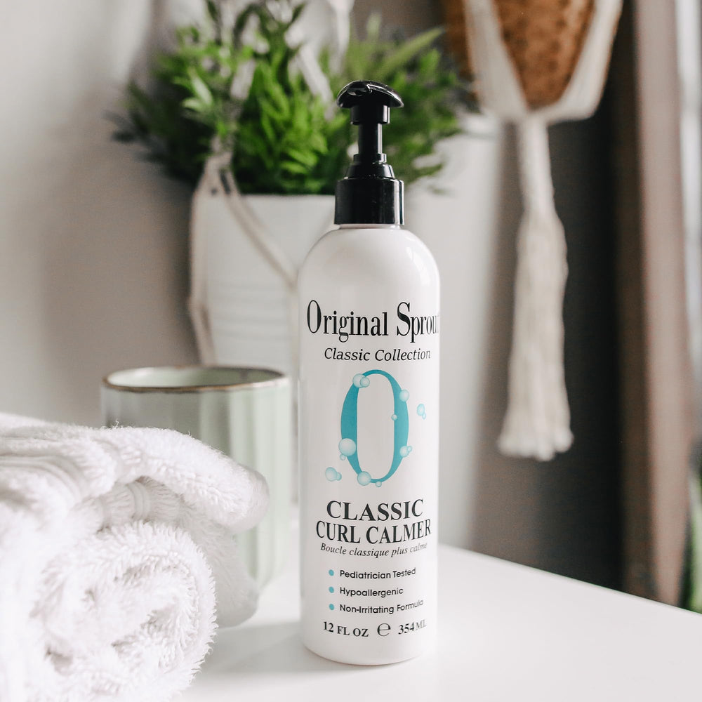 Original Sprout Curl Calmer hands dispense demonstrates easy application for damp or dry hair.