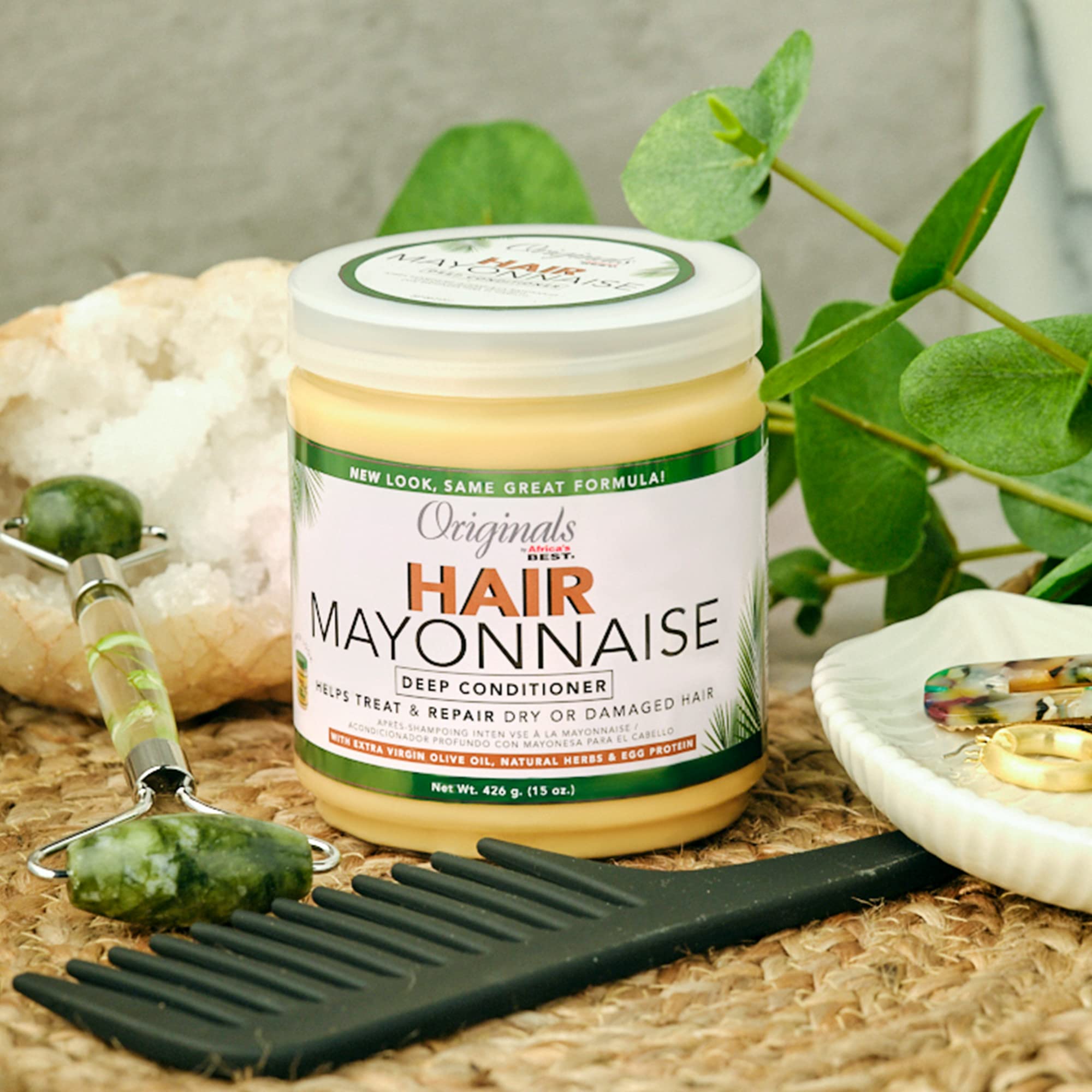Aplicación en el cabello con el acondicionador Mayonnaise de Originals by Africa's Best.