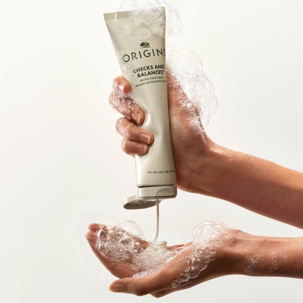 Origins Checks and Balances front packaging highlights vegan and naturally derived ingredients.