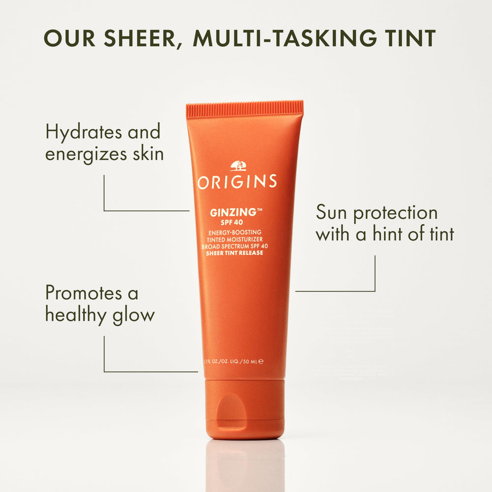 Origins GinZing pump closeup highlighting smooth application and light hydration.