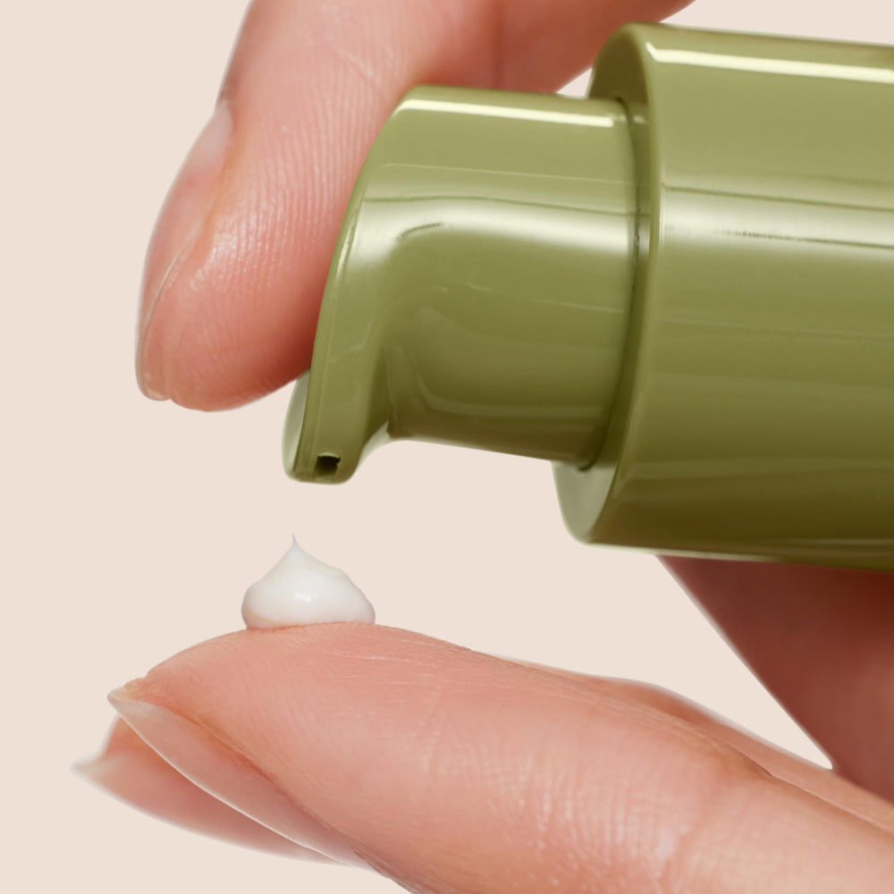 Origins Plantscription Power Eye Cream close-up texture shows creamy formula for gentle lift.