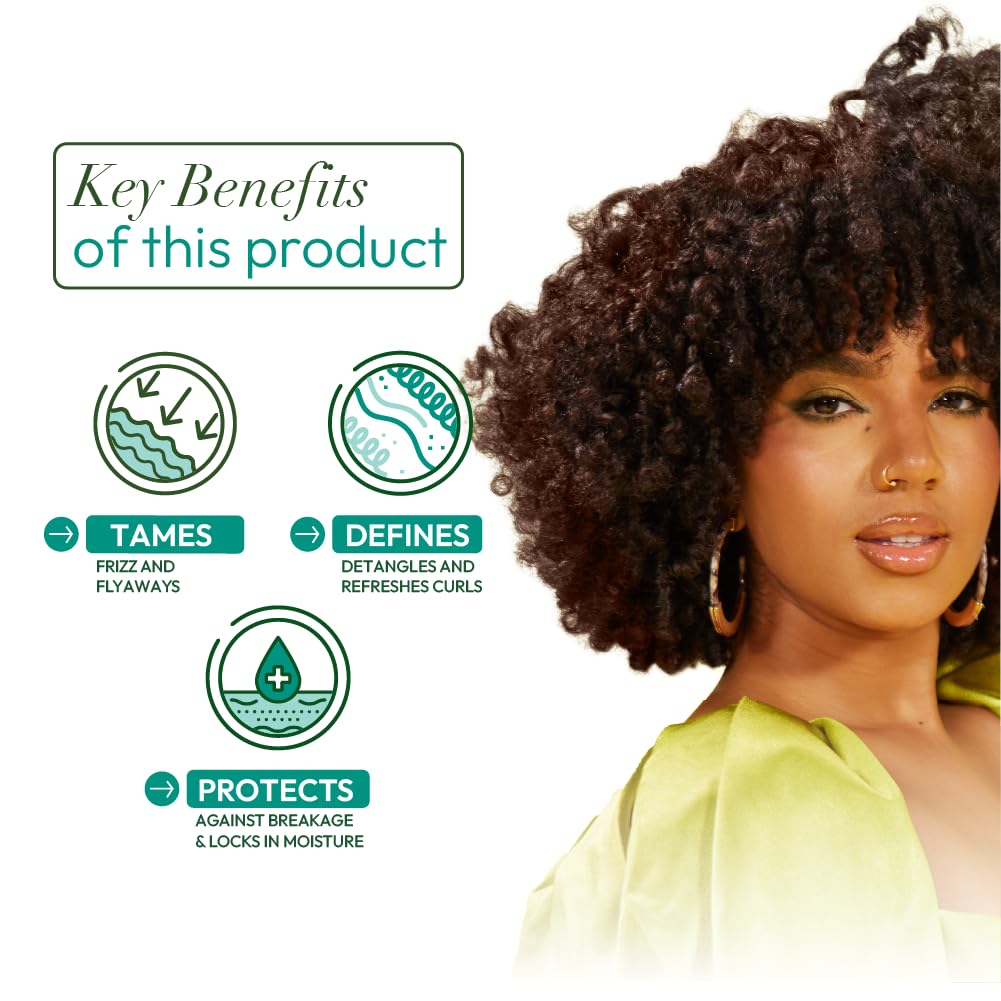 ORS Olive Oil Max Moisture Mousse on curly hair for defined texture.