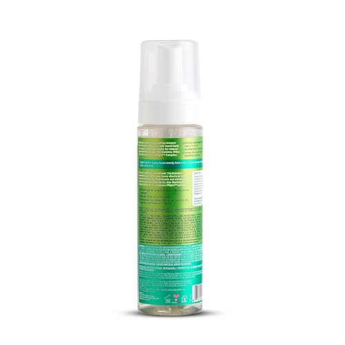 ORS Olive Oil Max Moisture Mousse texture close-up for smooth frizz control.