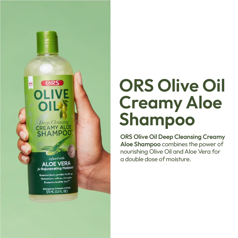 ORS Olive Oil Moisture Restore Shampoo foam — rich lather that rinses clean.