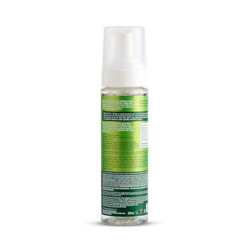 Foamy texture of ORS Wrap Mousse indicating fast-drying formula.