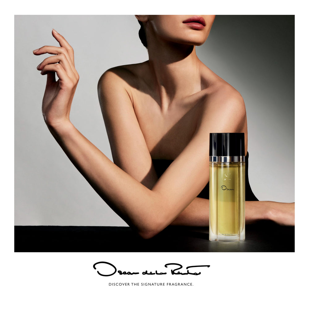 Top-view of Oscar de la Renta EDT bottle highlights sleek silhouette.