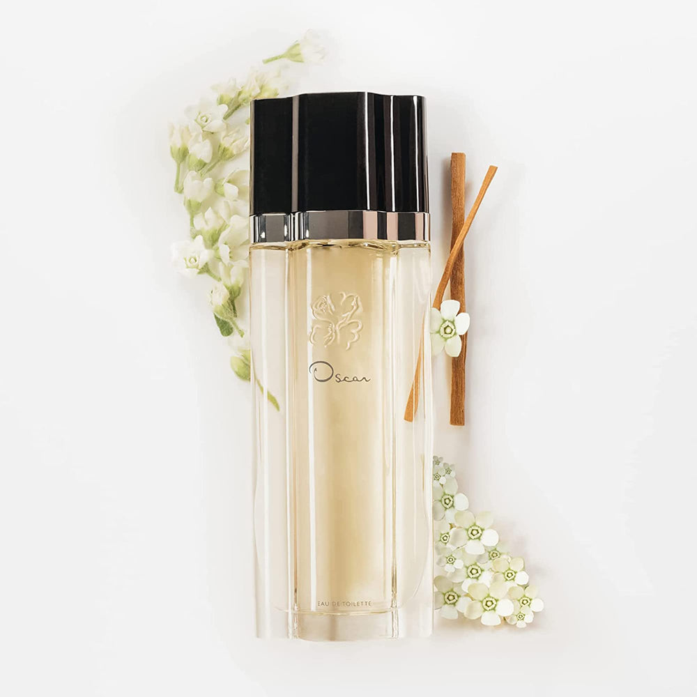 Compact lid of Oscar Signature Dusting Powder elevates daily beauty ritual.