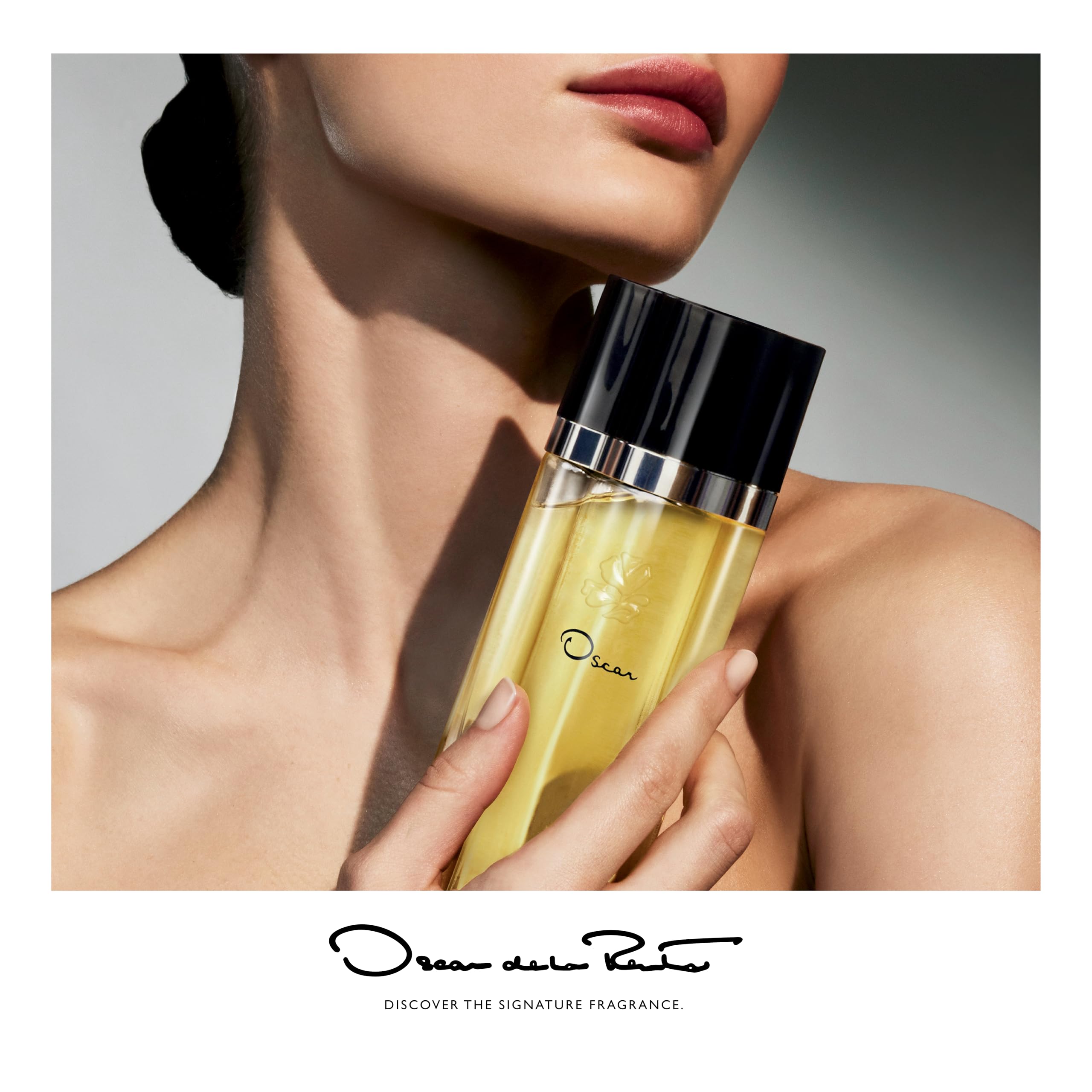 Oscar de la Renta Oscar Signature Dusting Powder compact highlights portable luxury for refresh.