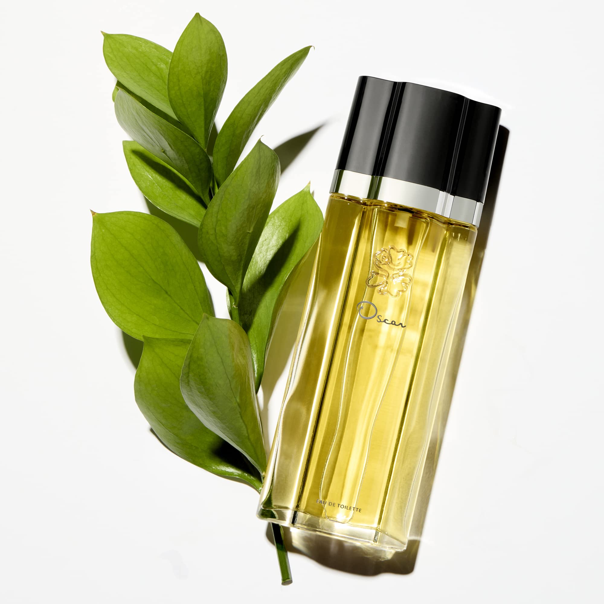 Floral-oriental inspired Oscar Signature Dusting Powder supports scent layering.