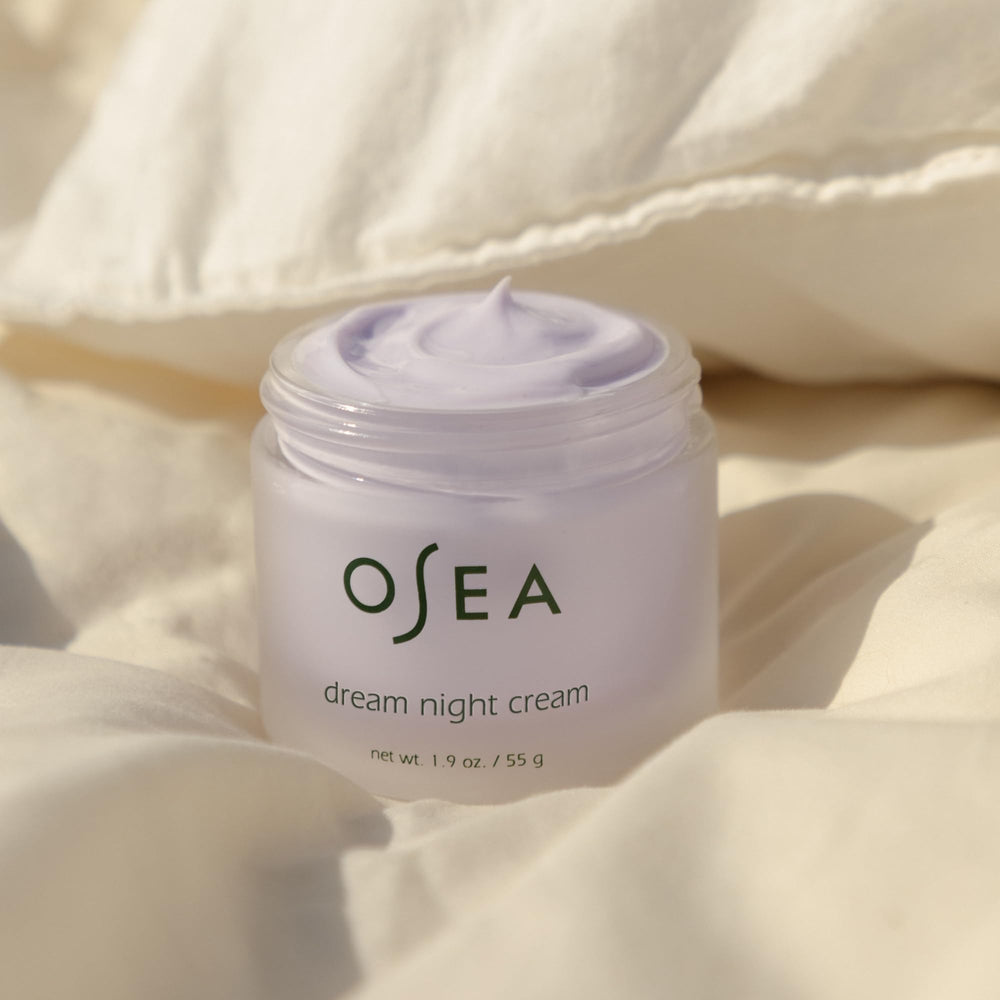 Face and neck application of OSEA Dream Night Cream during nighttime routine