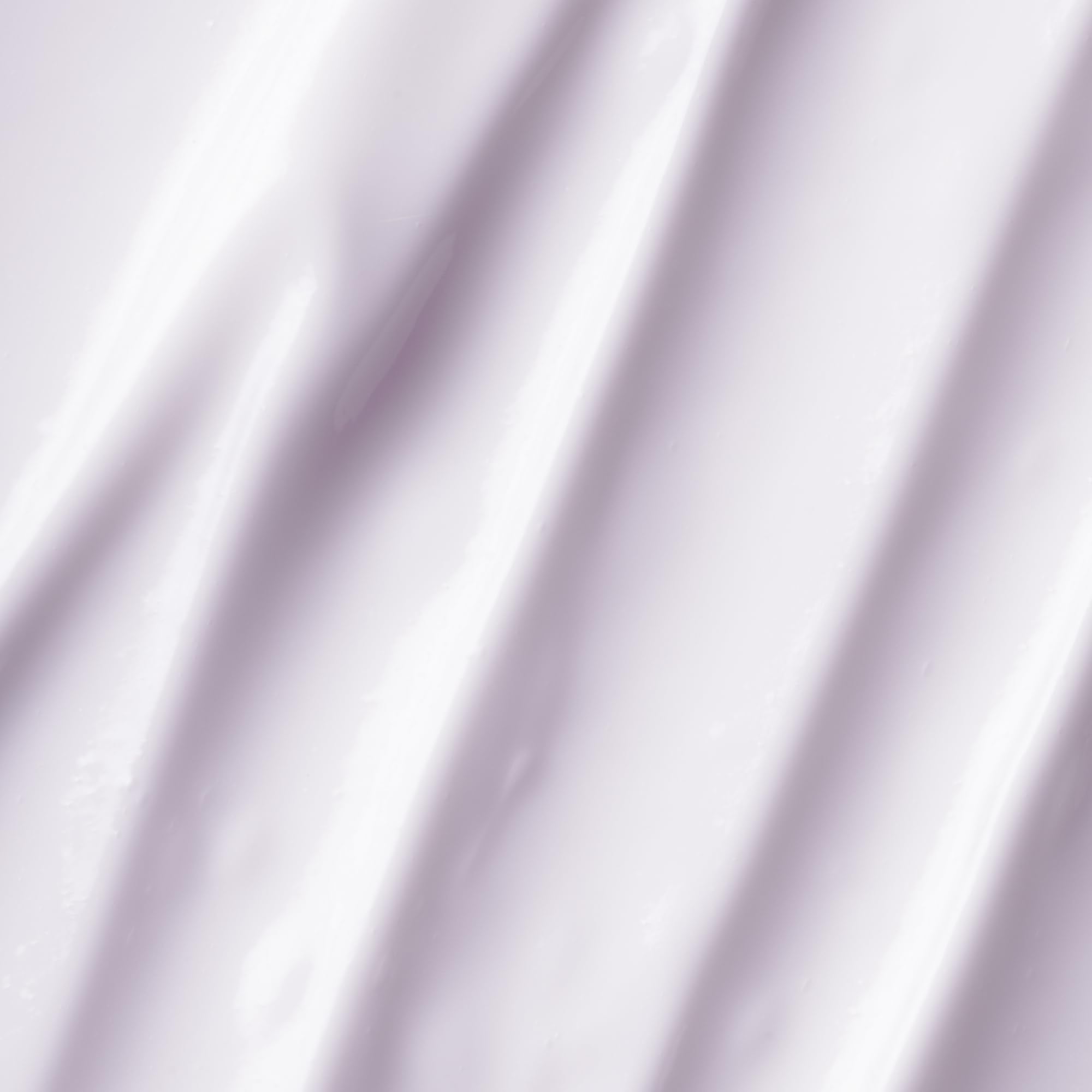 Duo-tone pump of OSEA Dream Night Cream in calming night routine context