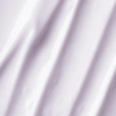 Duo-tone pump of OSEA Dream Night Cream in calming night routine context