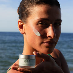 Application shot of OSEA Seabiotic Water Cream—non-greasy, weightless hydration during daily routine.