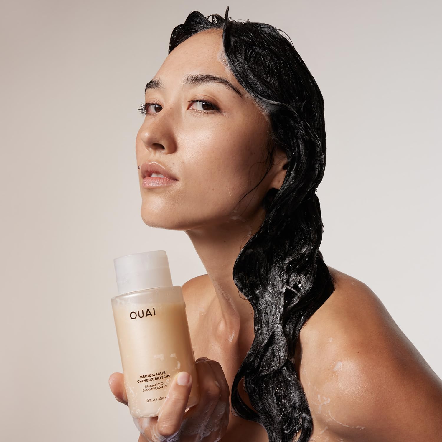 OUAI Medium Shampoo ingredients: babassu, coconut oil, and kumquat for nourishment.