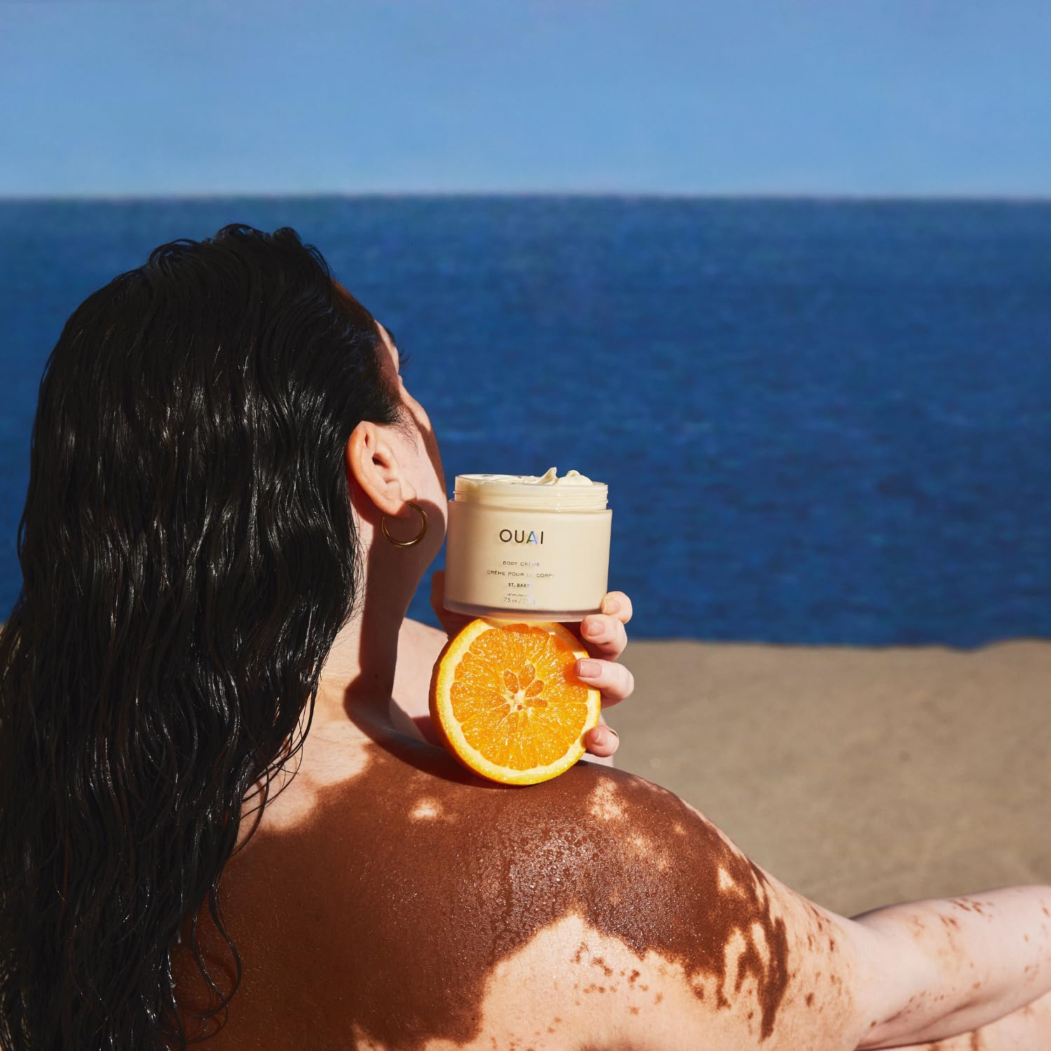 OUAI Body Cream massaged into damp skin for fast absorption and comfort
