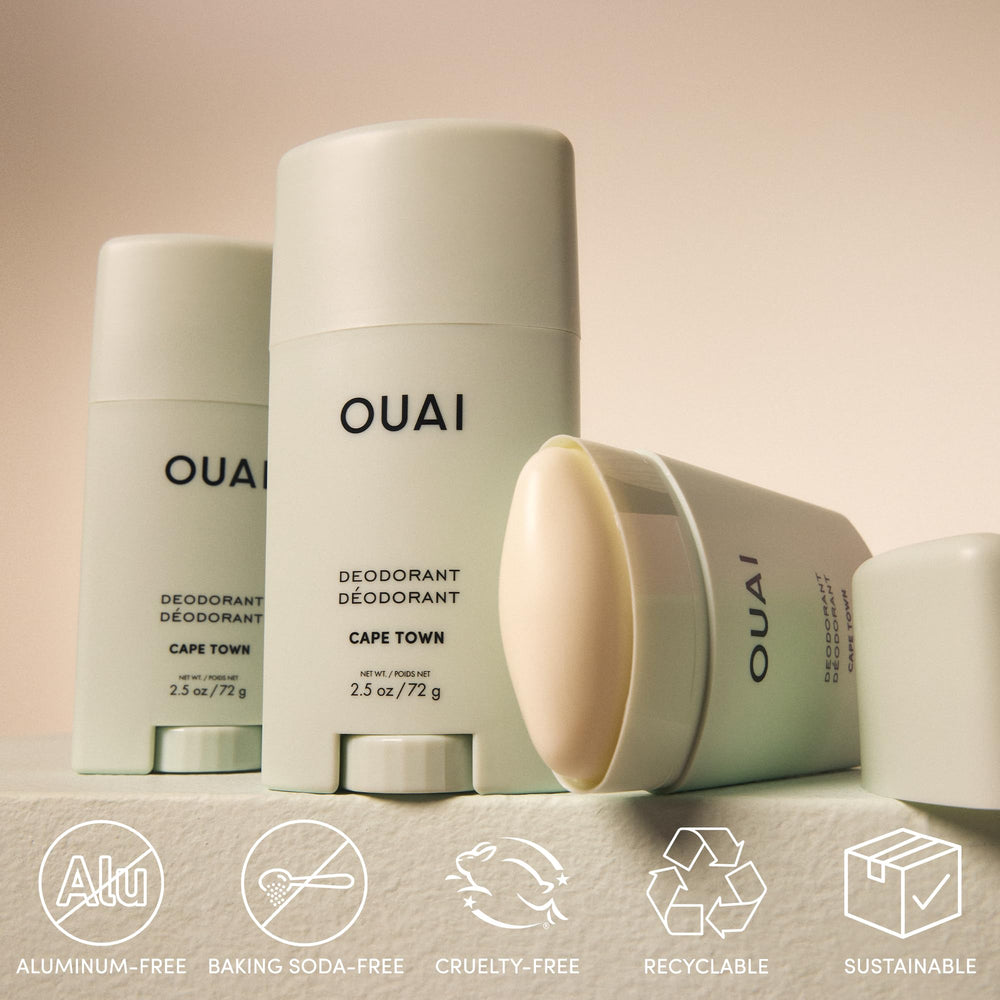 Fresh basil leaves beside deodorant for a vibrant scent profile.