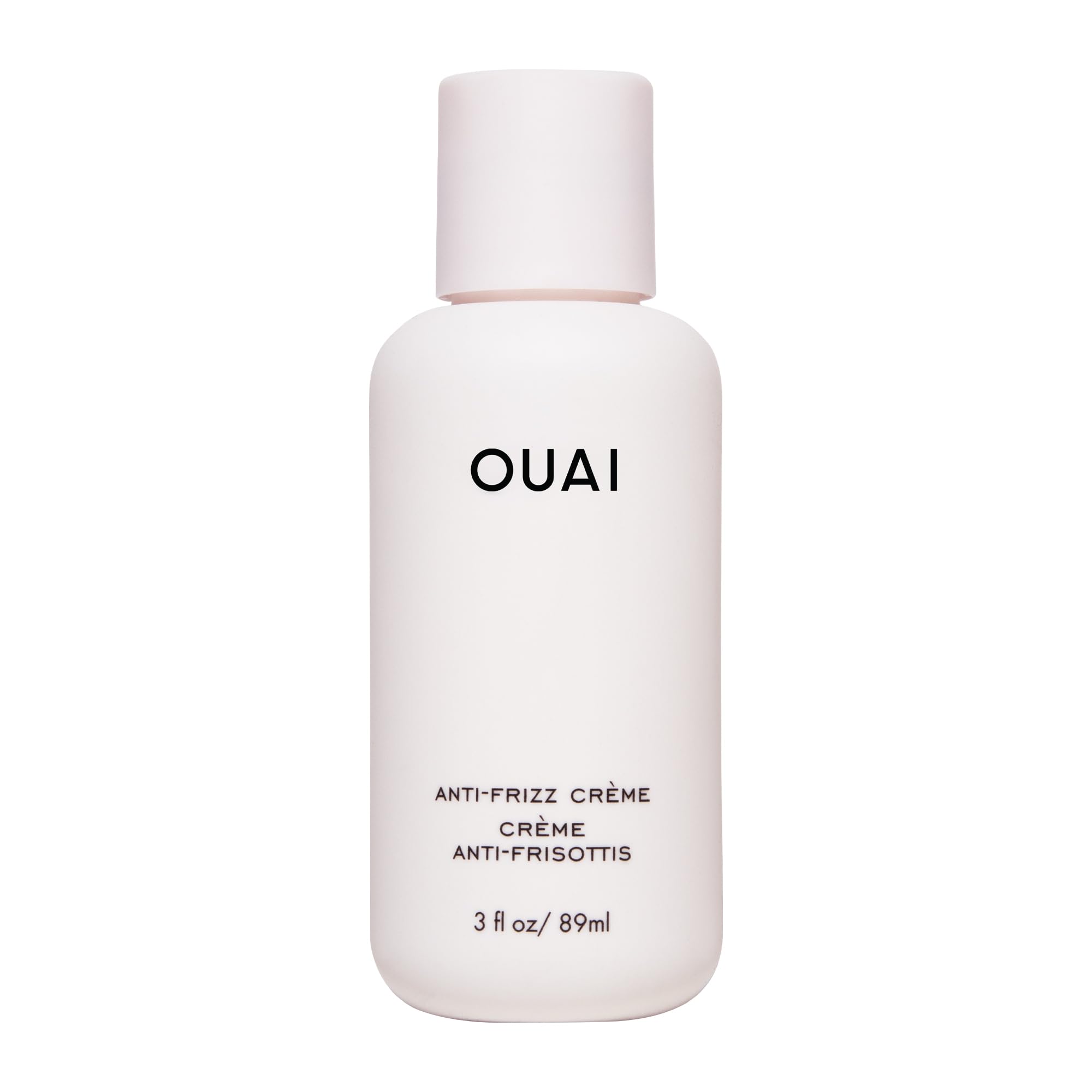 OUAI crema anti-frizz de viaje con una pulsación para control rápido del frizz.