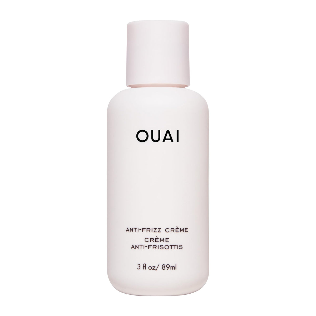 OUAI crema anti-frizz de viaje con una pulsación para control rápido del frizz.