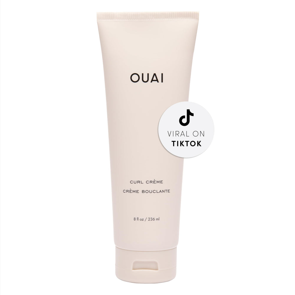 OUAI Curl Cream bottle front view showing defined, frizz-free curls.