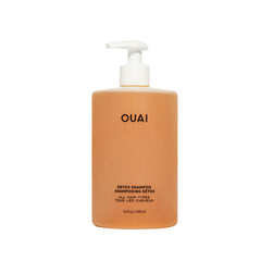 OUAI Detox Shampoo bottle pour shows cleansing action against buildup and grime