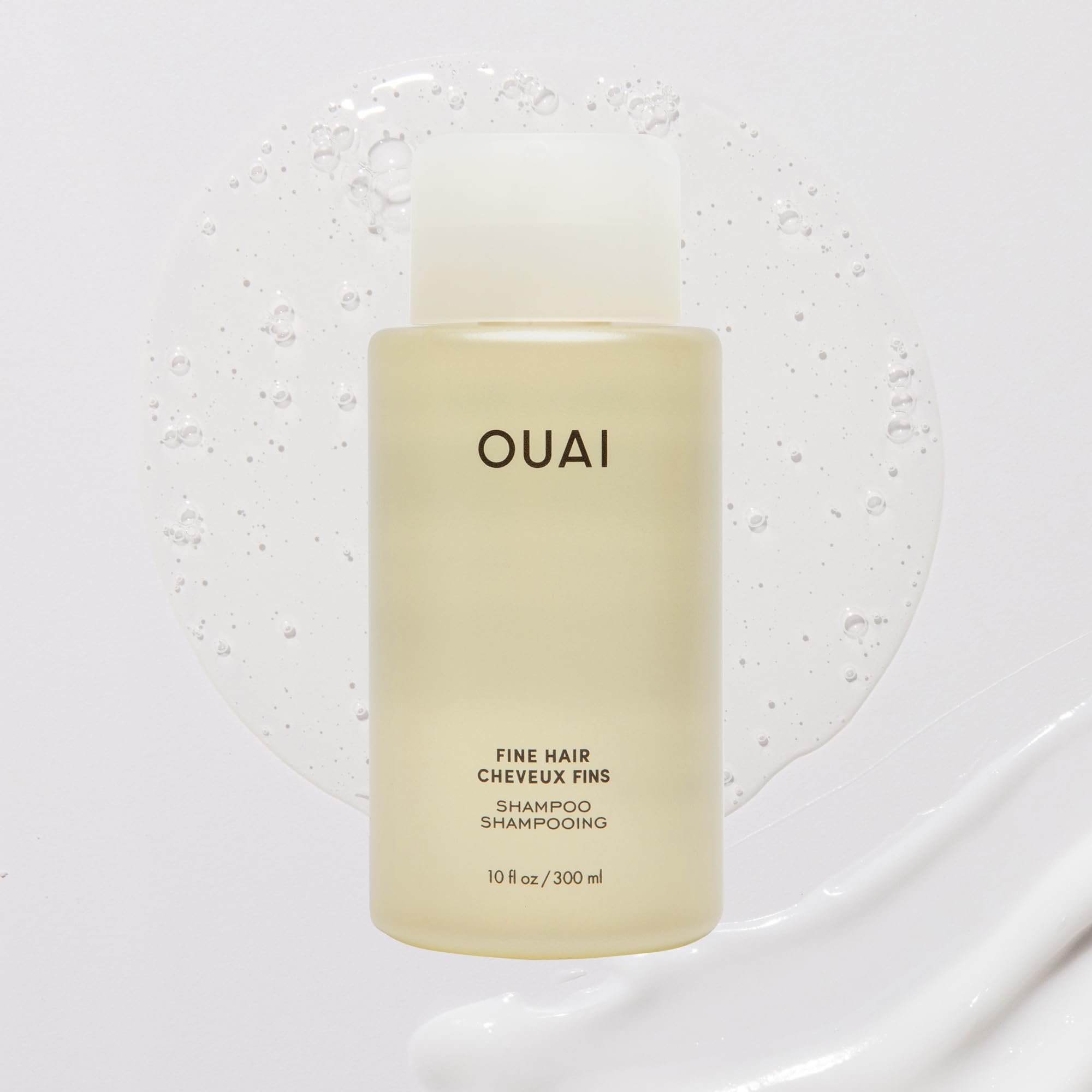 Limpieza suave sin sulfatos de OUAI Fine para cabello sensible.
