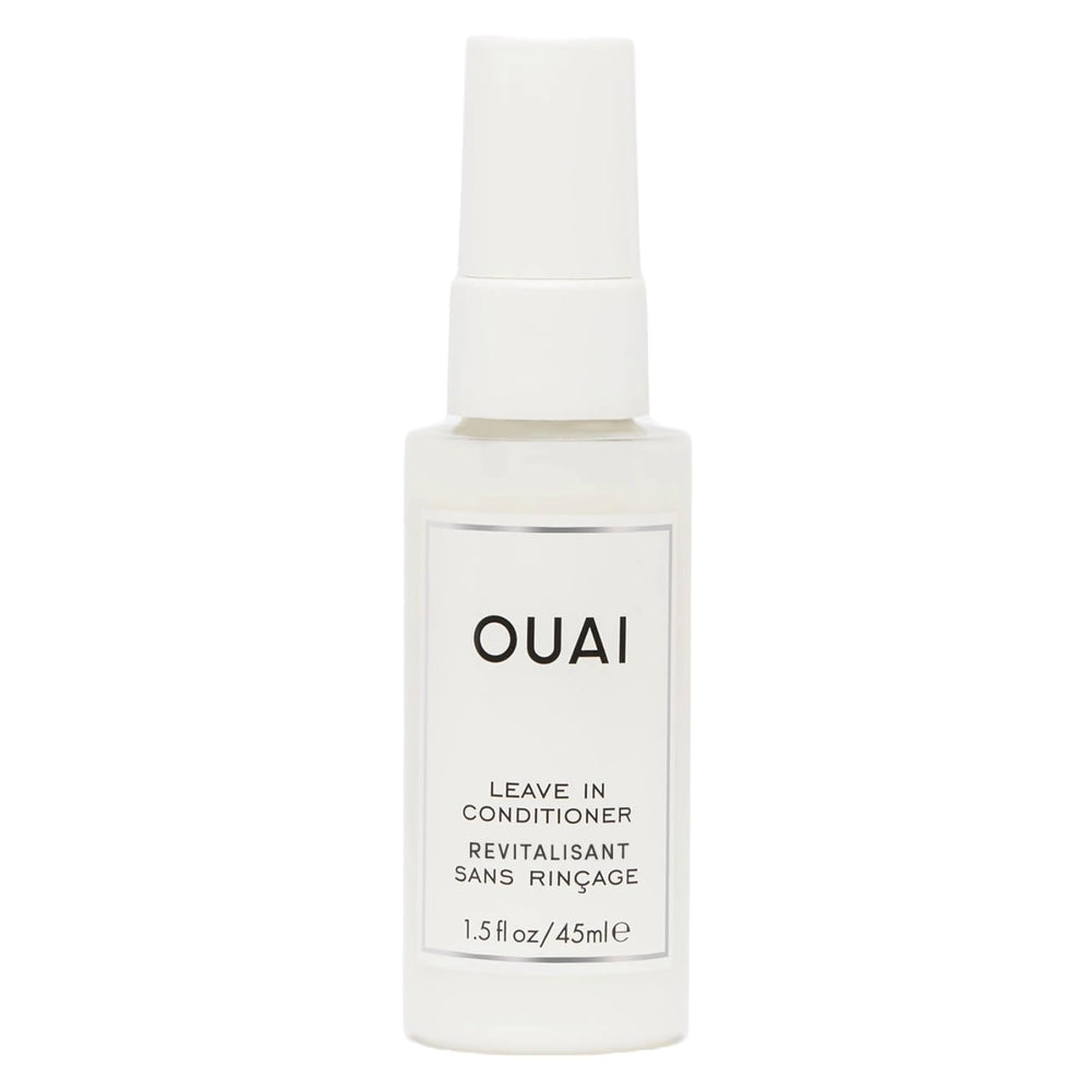 OUAI leave-in conditioner bottle ready for heat protection and detangling on the go.