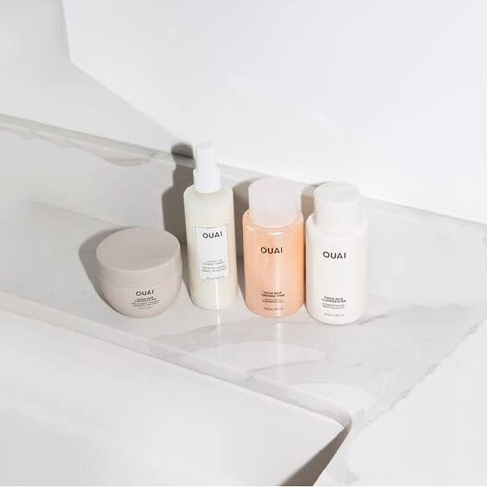 OUAI luxury scent label: premium fragrance enhances salon-like experience.