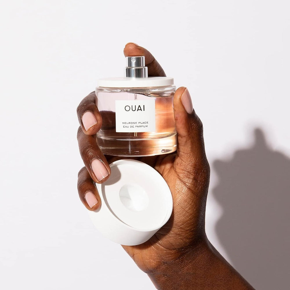 OUAI Melrose Place amber and cedarwood base conveys lasting warmth