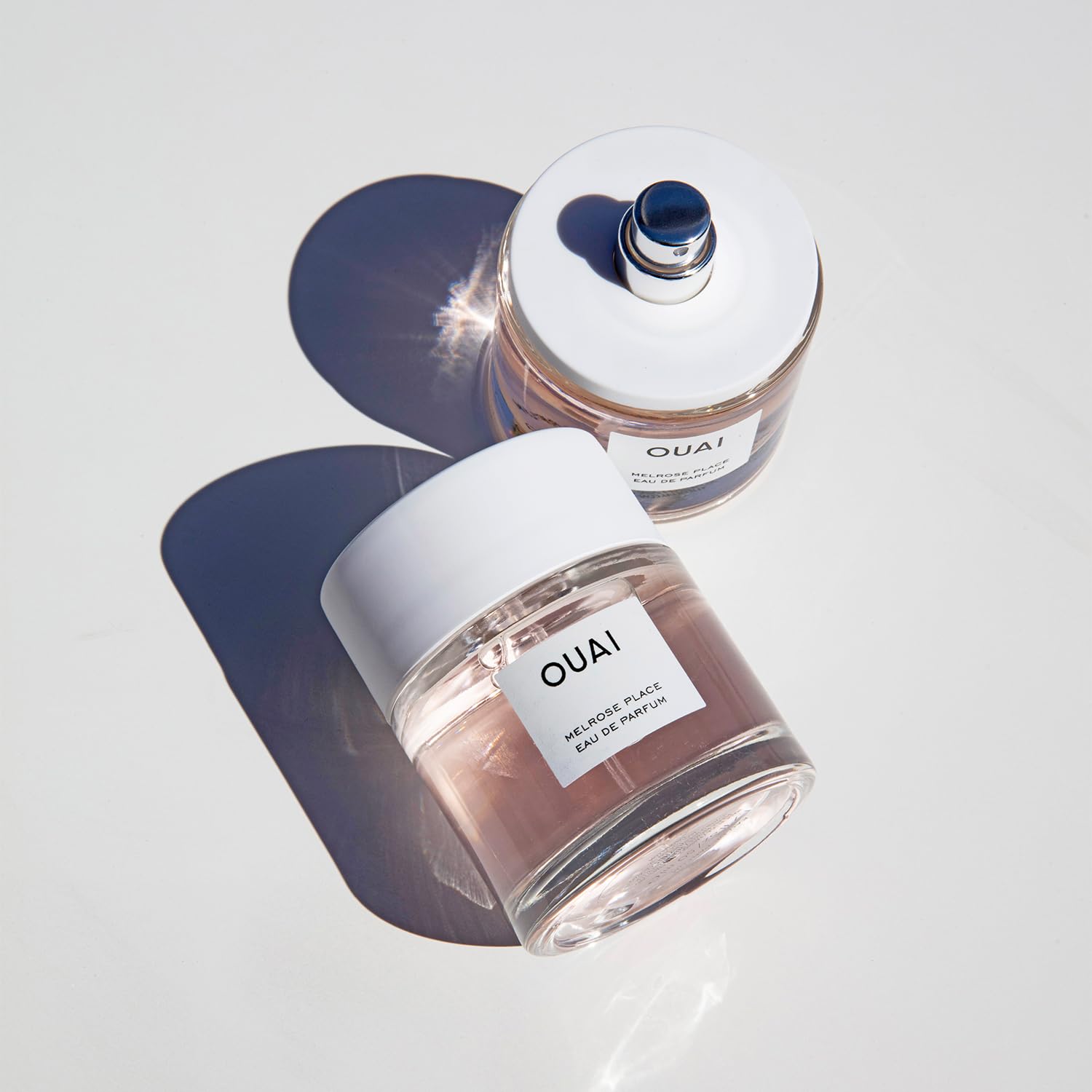 OUAI Melrose Place scent diffusion on skin showing long-lasting floral trail