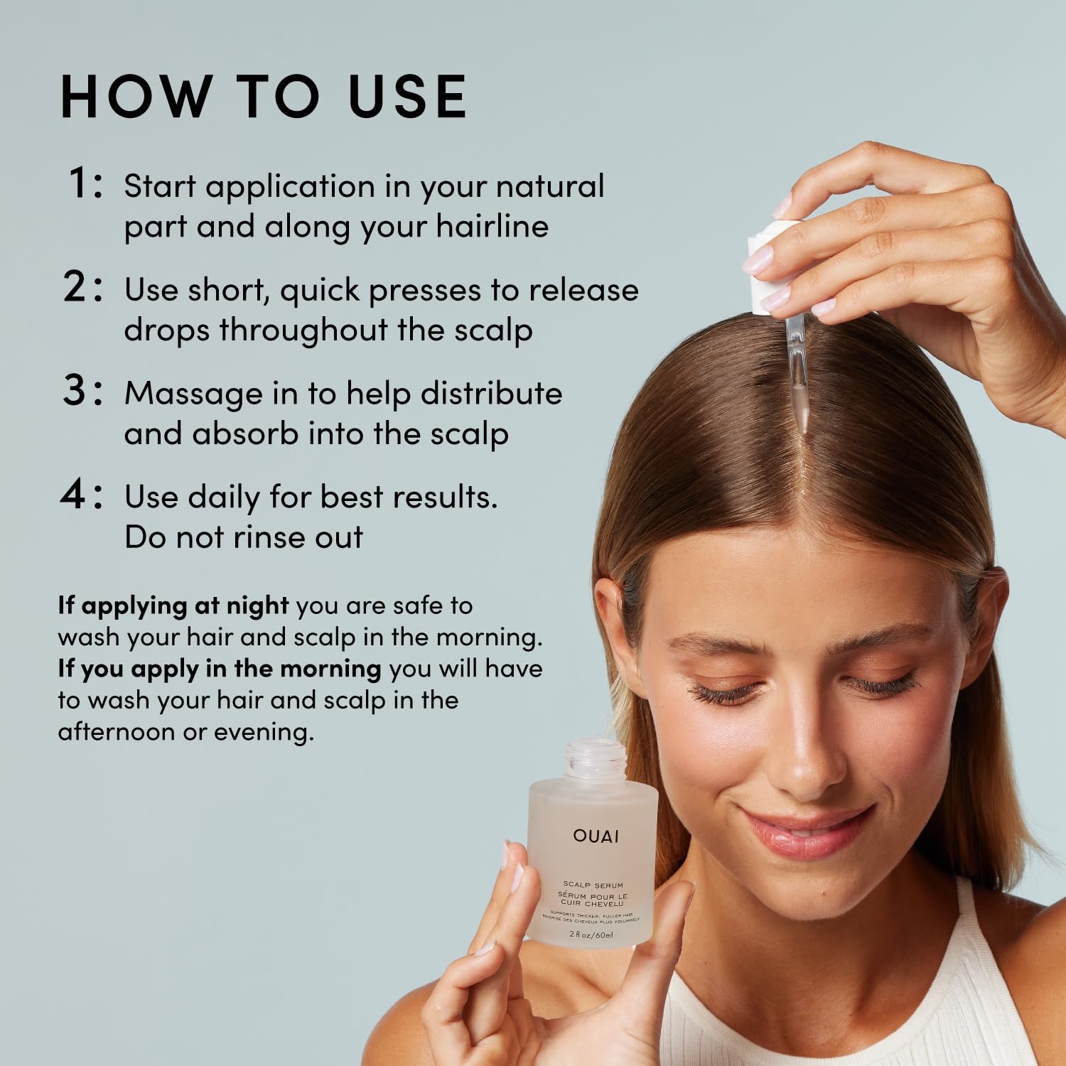Applying OUAI Scalp Serum to the scalp.