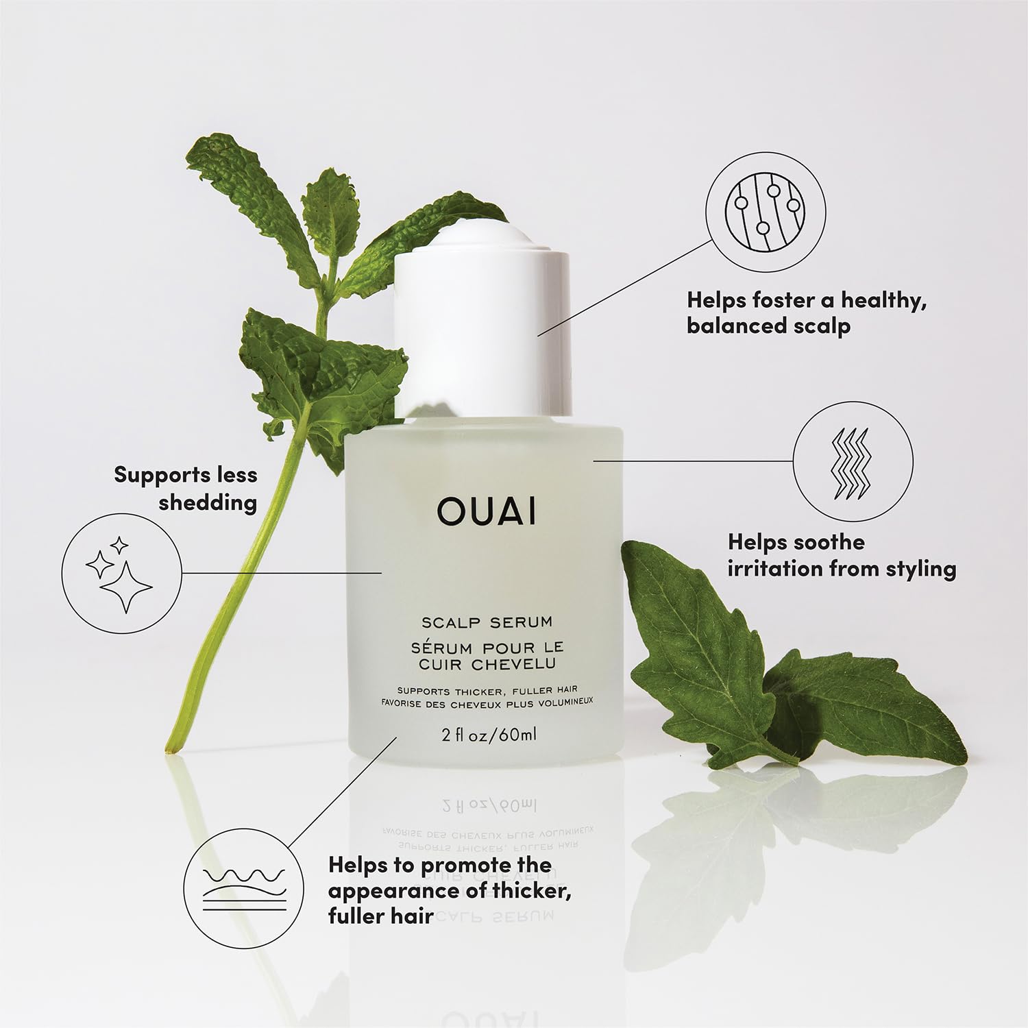 Close-up of OUAI Scalp Serum dropper ready to apply.