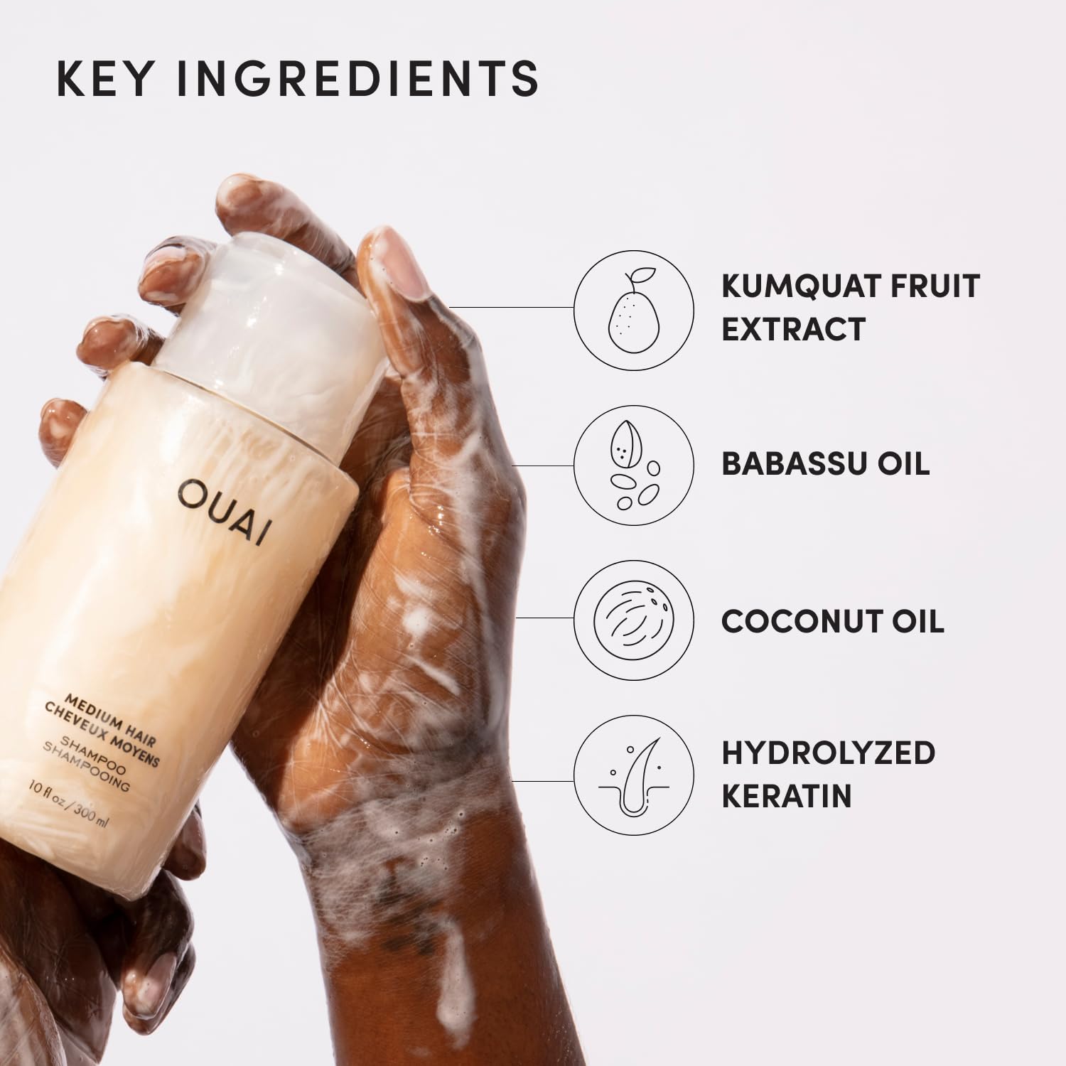 Morning bathroom routine featuring OUAI shampoo for effortless care.