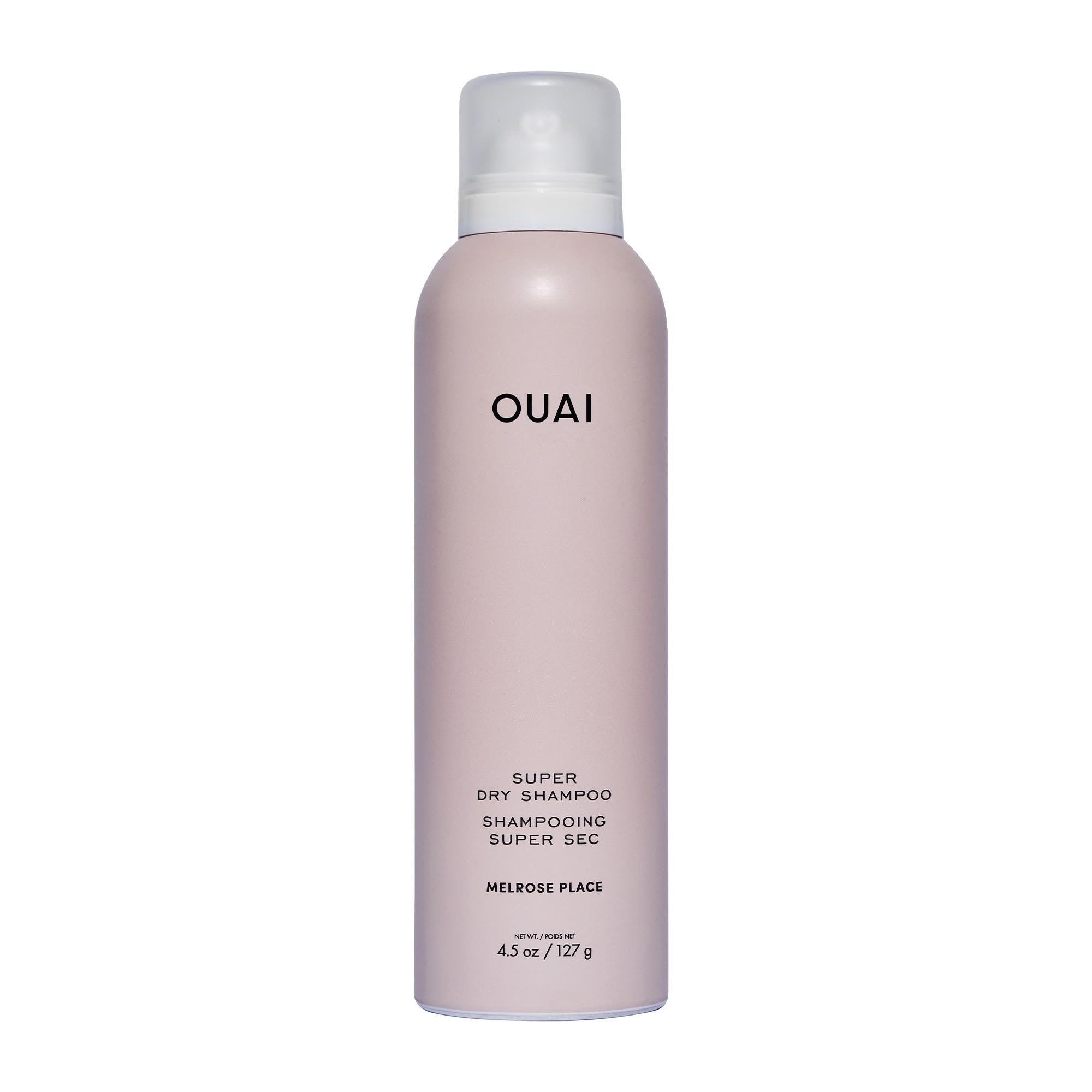 OUAI Super Dry Shampoo bottle demonstrates oil-absorbing formula for quick refresh.